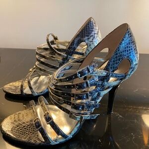 Carlos Santana snake print heels